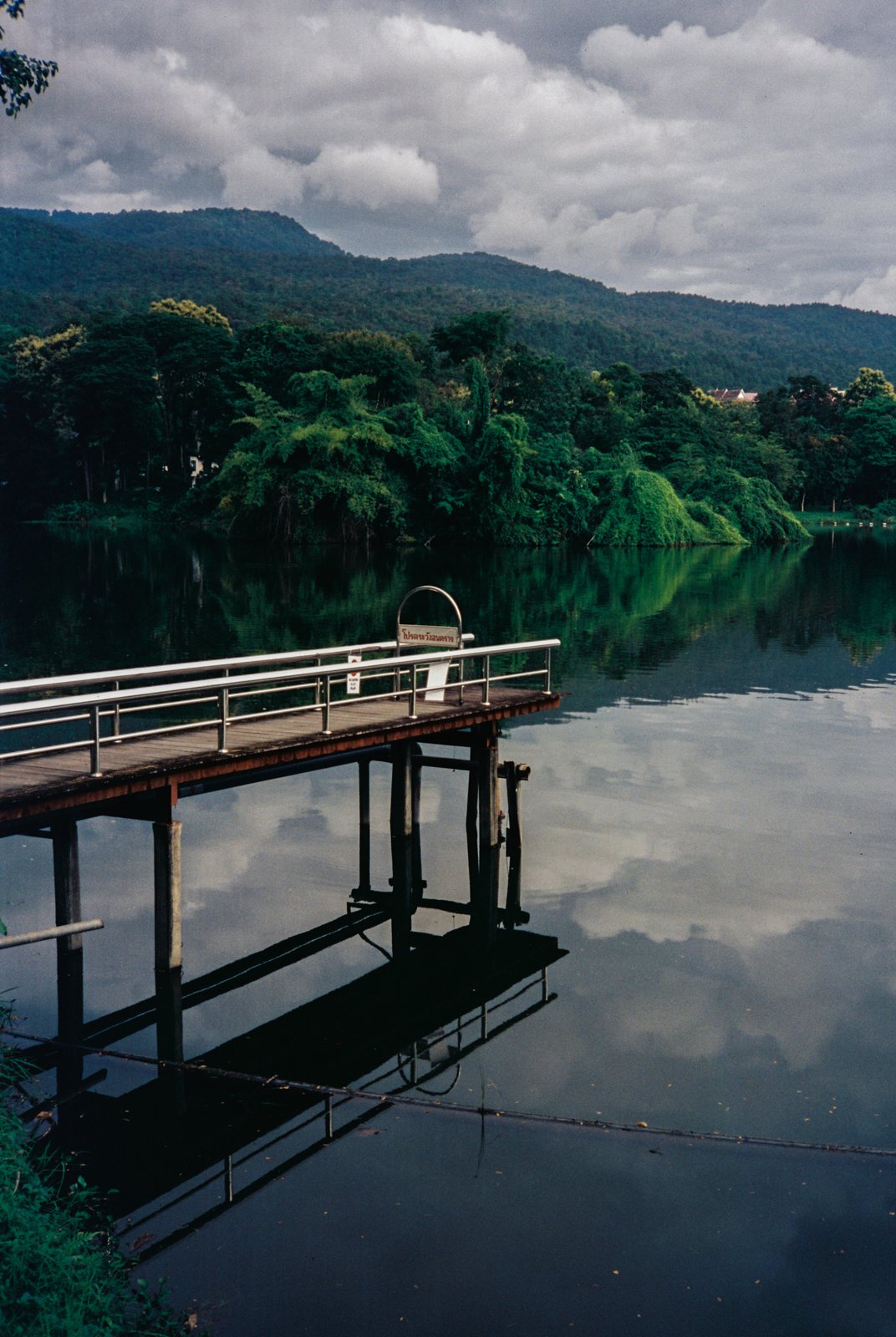 A jetty on a still lake