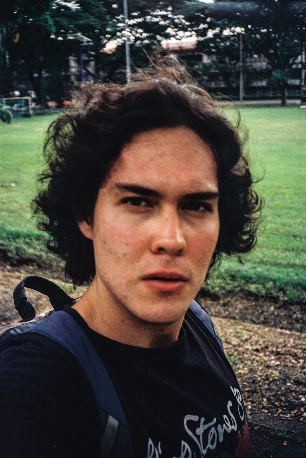 A self-portrait in a park