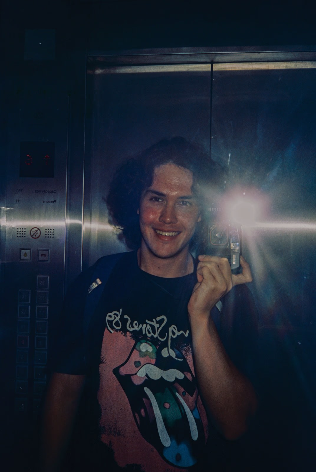 A selfie in a lift, the flash on