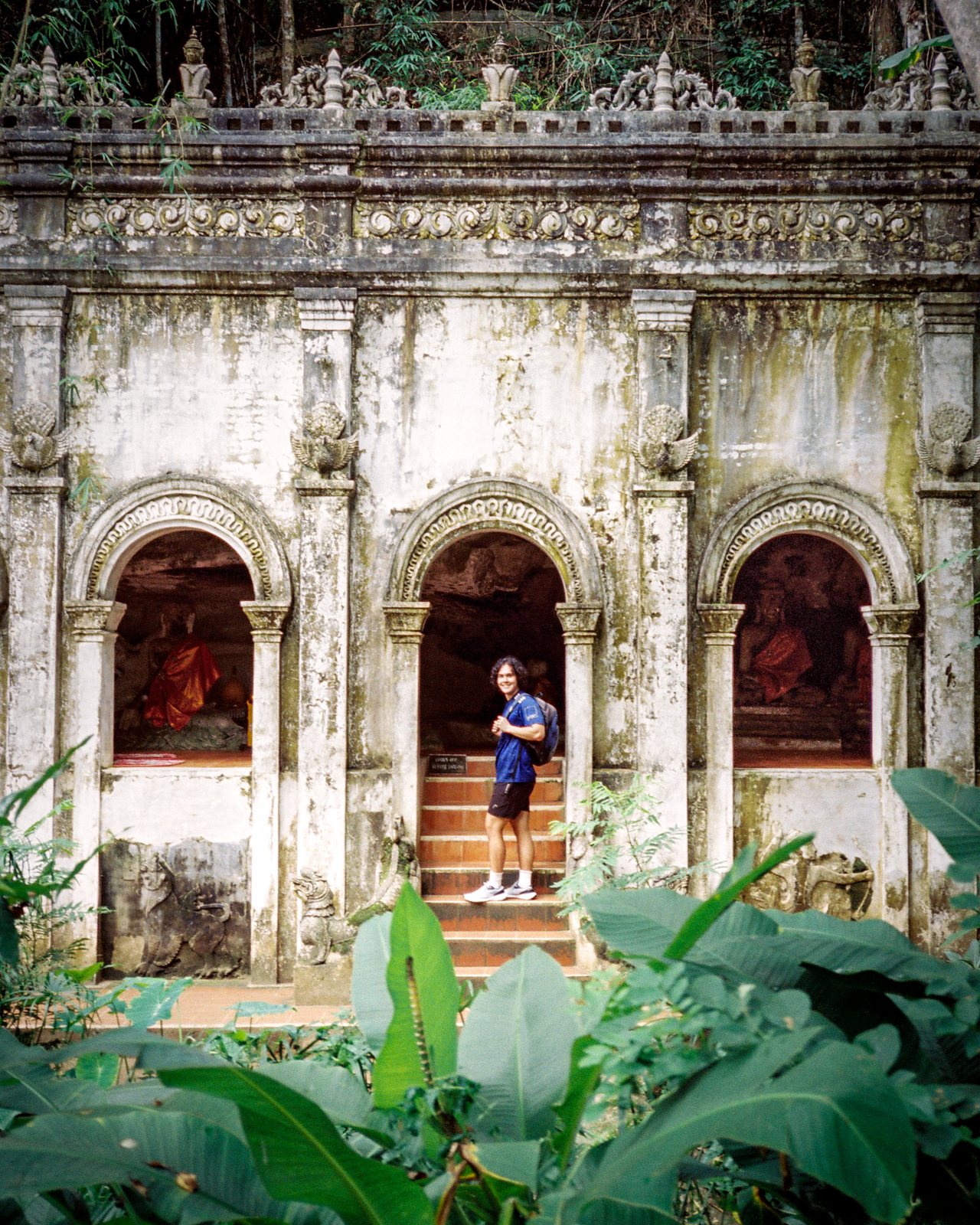 An old temple front with three arches